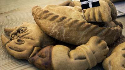 Up close shot of pasties and Cornish flag